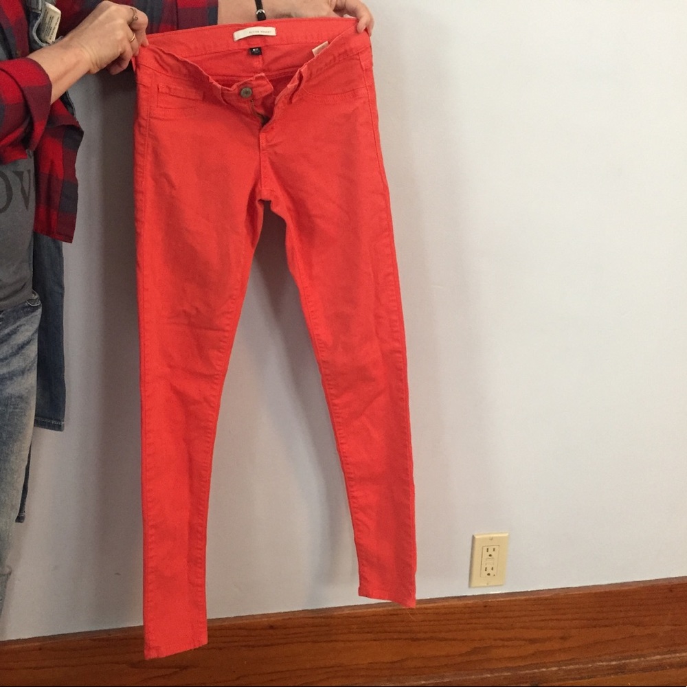 Orange, flying monkey skinny jeans